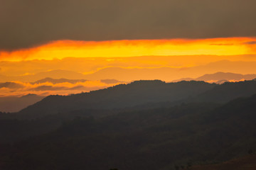 Sunrise.Mountain valley during sunrise. Natural summer landscape.Lighting before sunrise at the morning time.Thailand.
