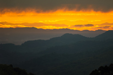 Sunrise.Mountain valley during sunrise. Natural summer landscape.Lighting before sunrise at the morning time.Thailand.