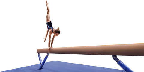 Female athlete doing a complicated exciting trick on gymnastics balance beam on white background....