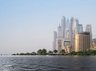 Naklejka premium Digital composite of flooded beach at Jumeirah beach in Dubai Marina, UAE