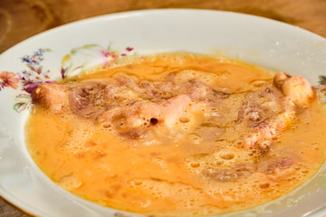 Preparing chicken meat schnitzel