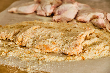 Preparing chicken meat schnitzel