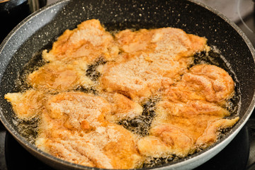 Preparing chicken meat schnitzel