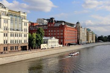 Fototapeta na wymiar Yakimanskaya Embankment of the Vodootvodnyy Channel (Drainage Channel) in Moscow in July