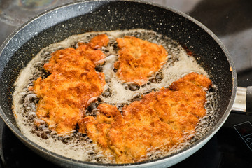 Preparing chicken meat schnitzel