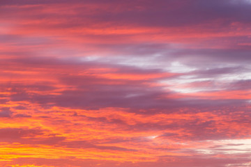 Naklejka na ściany i meble Beautiful soft dramatic sunrise orange pink sky with clouds background texture