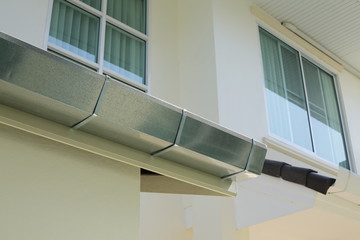 stainless steel of roof gutter on residential house building