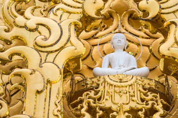 White monk statue at white temple Wat Rong Khun, Chiangrai, Thailand.