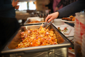Modern cafe. A stand with fried food