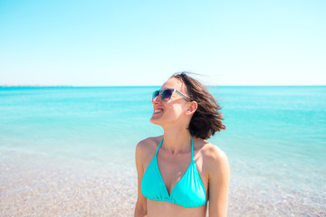 girl smiling near the ocean