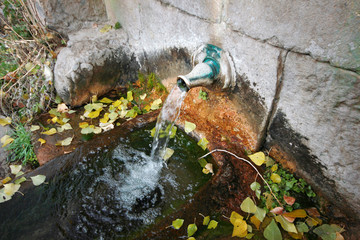 Stone fountain mountain water