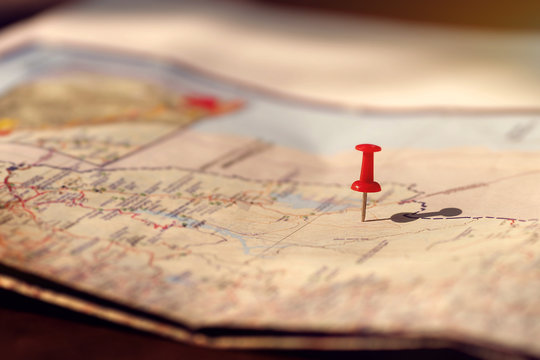 Putting pins to  destination on map. Plan travelling and relax with holiday concept.