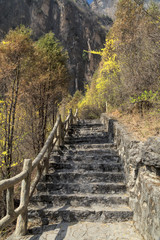A steep stone staircase in a valley