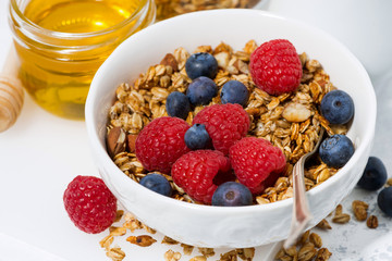 fresh cottage cheese with granola and honey, top view