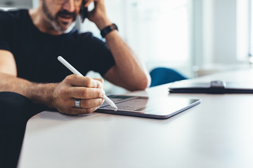 Businessman using technology at work