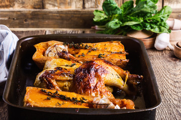 Roasted chicken with seasonal autumn butternut squash, garlic and herbs