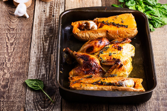 Roasted chicken with seasonal autumn butternut squash, garlic and herbs