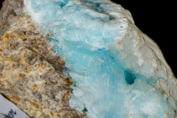 Macro stone cobalt calcite mineral on a black background