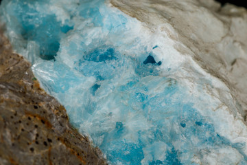 Macro stone cobalt calcite mineral on a black background