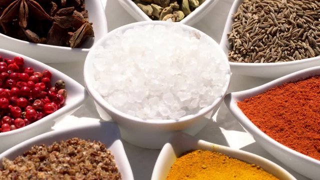 Spices. Various Indian. Spice and herbs rotate. Assortment of Seasonings, condiments. Cooking ingredients, flavor. 4K video Beautiful view