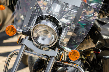headlight chopper motorcycle closeup