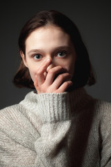 Portrait of the scared young woman