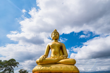 Large golden Buddha statue in chiang rai, thailand.