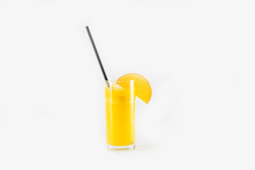 glass of orange juice on a white background