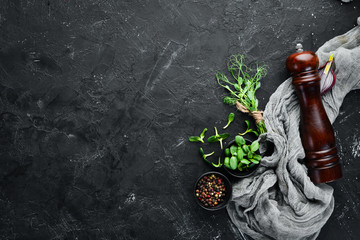 Cooking banner. Kitchen board, spices and cutlery. Top view. Free space for your text. Rustic style.