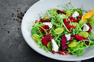 Salad. Arugula, blue cheese and beet salad. Top view.