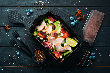 Vegetable salad with turkey breast. Healthy food, restaurant dish delivery. Top view. Free space for your text.