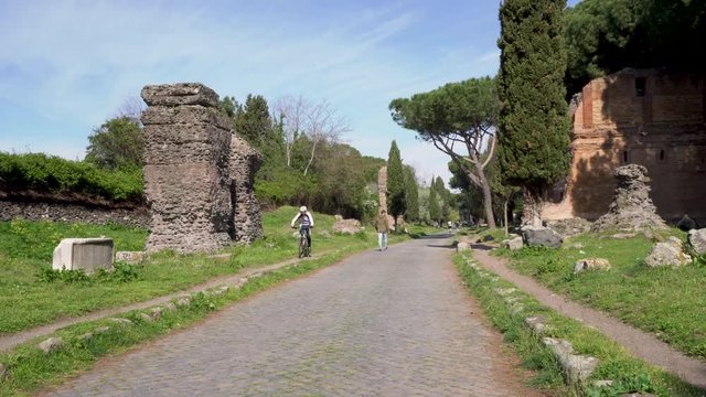 The ancient Appian Way (Appia Antica) in Rome on a sunny morning.