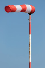 windsock against blue sky