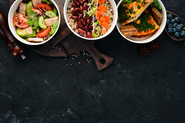 Collection of take away foil boxes with healthy food. Set of containers with daily meals. Top view. Free copy space.