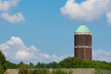 water tower of Axel against blue sky, The Netherlands. Space for text