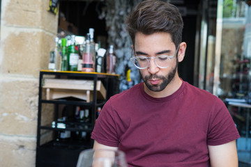 Young  man smiling in the restaurant