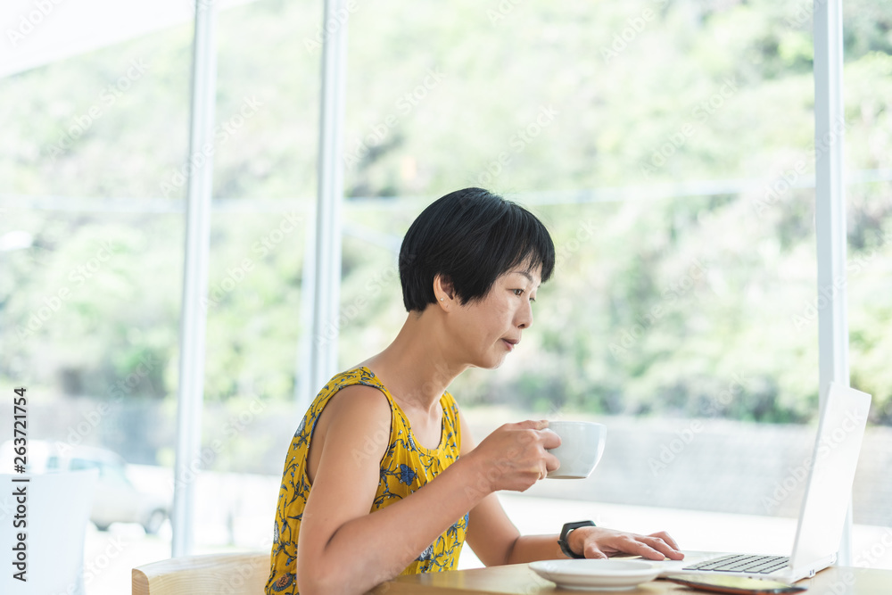 Poster asian woman working and using laptop