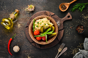 Pickled cabbage, cucumbers and tomatoes. On the old background. free copying space.