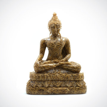 Image of Buddha, Buddha statue buddha image used as amulets of Buddhism religion,made from rice grain,Isolated from the white background.