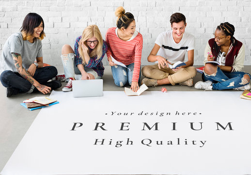 Group of Friends in a Meeting Using Paper Mockup
