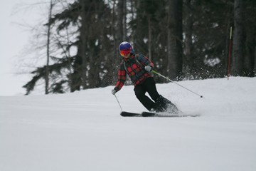 Fototapeta na wymiar Skier down the snow-covered slopes, Sochi, Russia.