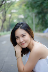 Fototapeta na wymiar Portrait of thai adult beautiful girl relax and smile