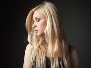Naklejka premium Attractive girl with beautiful blonde hair