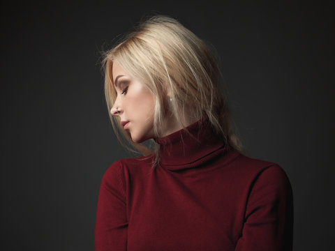 Beautiful Young Woman In Red  Turtleneck