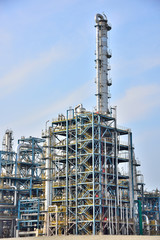 Close-up of pipelines and destillation tanks of an oil-refinery plant