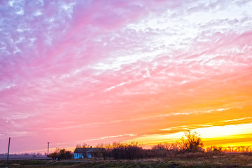 Bright sun and clouds, countryside.