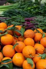 Fototapeta na wymiar New harvest of sweet ripe oranges fruits on market