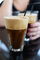 Traditional greek cold coffee Frappe made from water, instant coffee and ice cubes