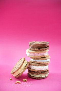 Stack of whoopi pies on bright pink background