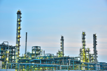 Close-up of pipelines and destillation tanks of an oil-refinery plant
